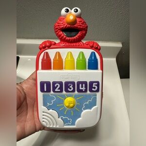 Sesame Street Elmo Musical Crayon box toy